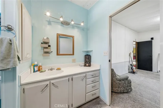 a kitchen with lots of counter top space and appliances