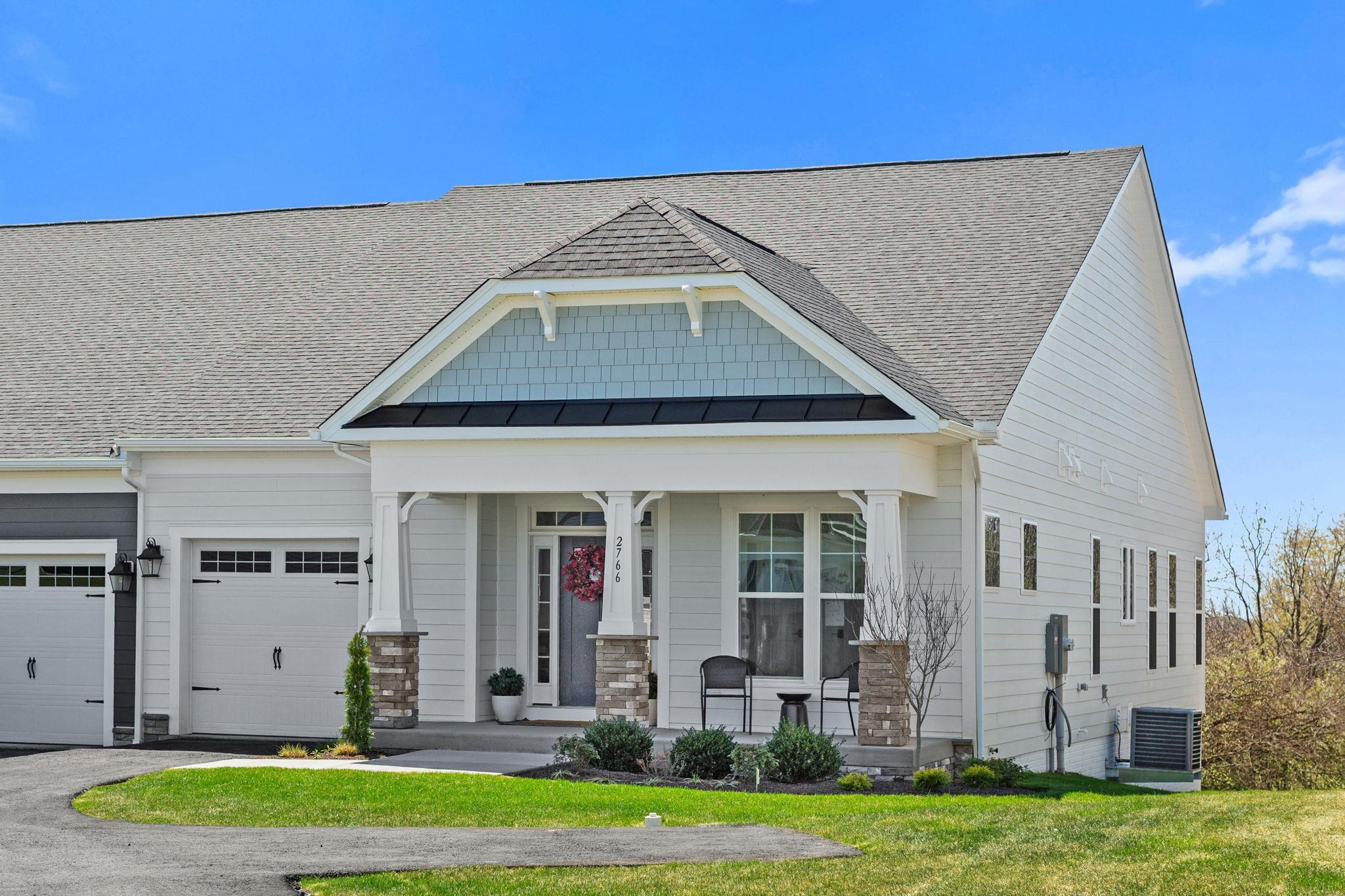 2766 Rutlege Road, Unit 191 Harrisonburg, VA 22801 - Photo 2 of 46 a front view of a house with a yard