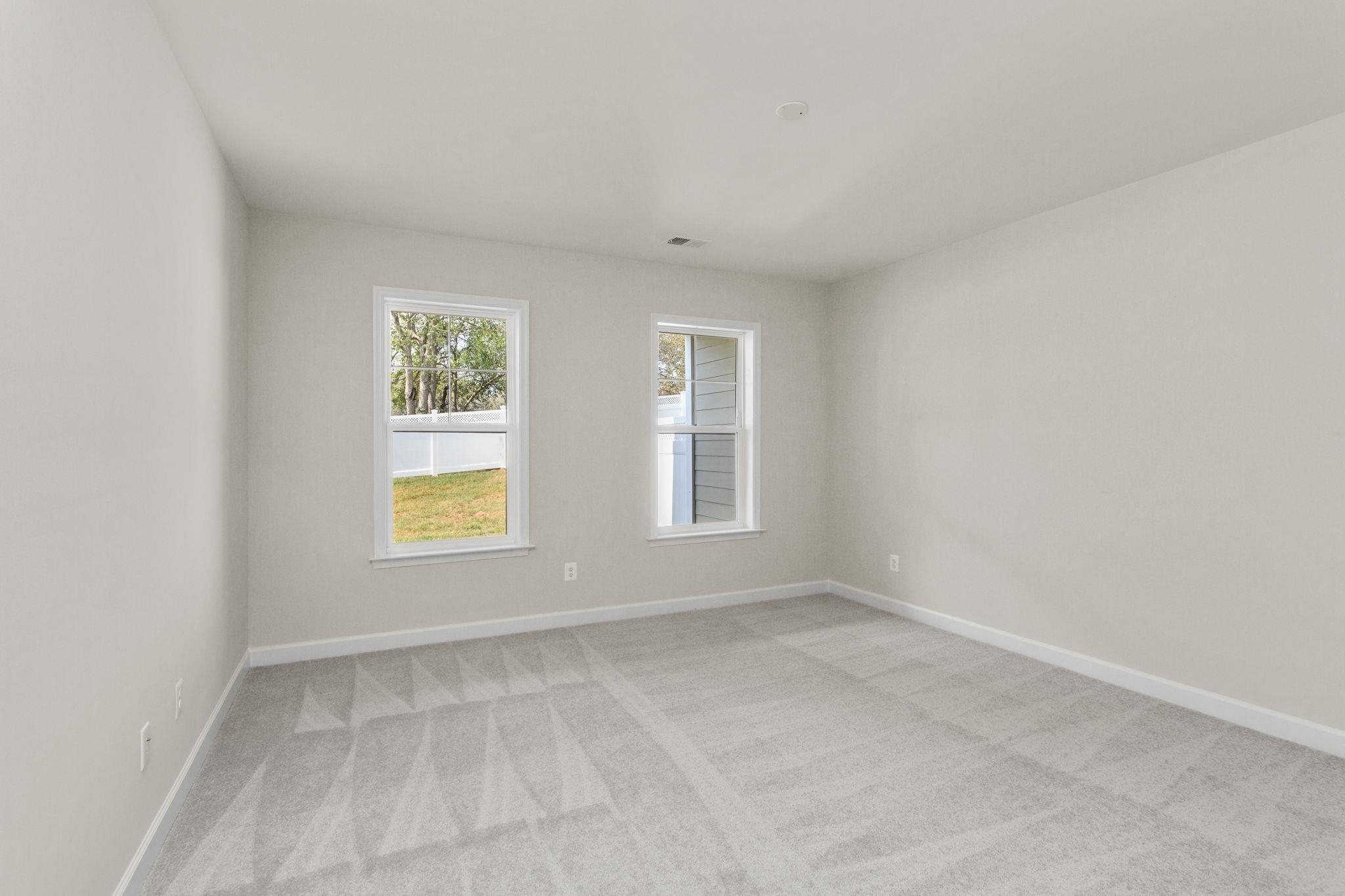 2766 Rutlege Road, Unit 191 Harrisonburg, VA 22801 - Photo 29 of 33 an empty room with windows