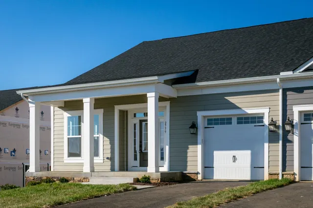 front view of a house with a small yard