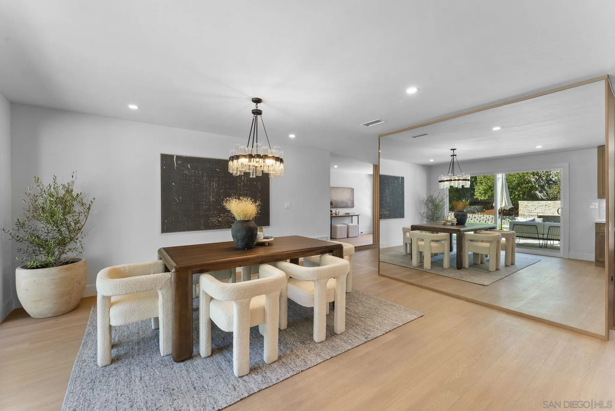 12830 Avenida La Valencia Poway, CA 92064 - Photo 15 of 47 a dining room with furniture and a chandelier