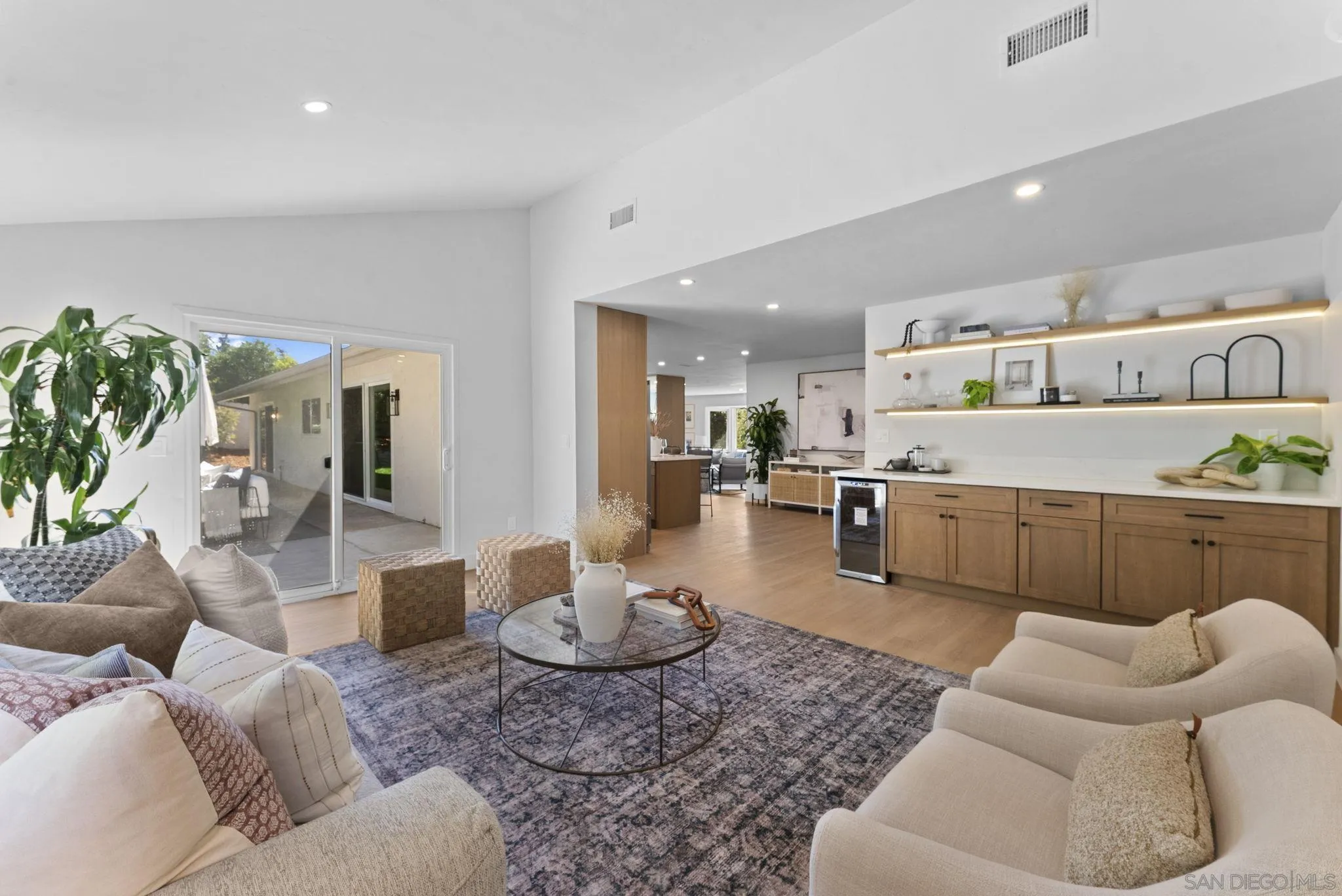 12830 Avenida La Valencia Poway, CA 92064 - Photo 18 of 47 a living room with furniture and kitchen view
