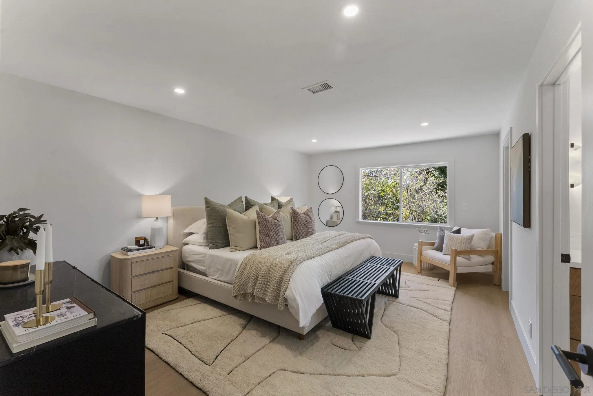 12830 Avenida La Valencia Poway, CA 92064 - Photo 20 of 47 a bedroom with a bed and a couch