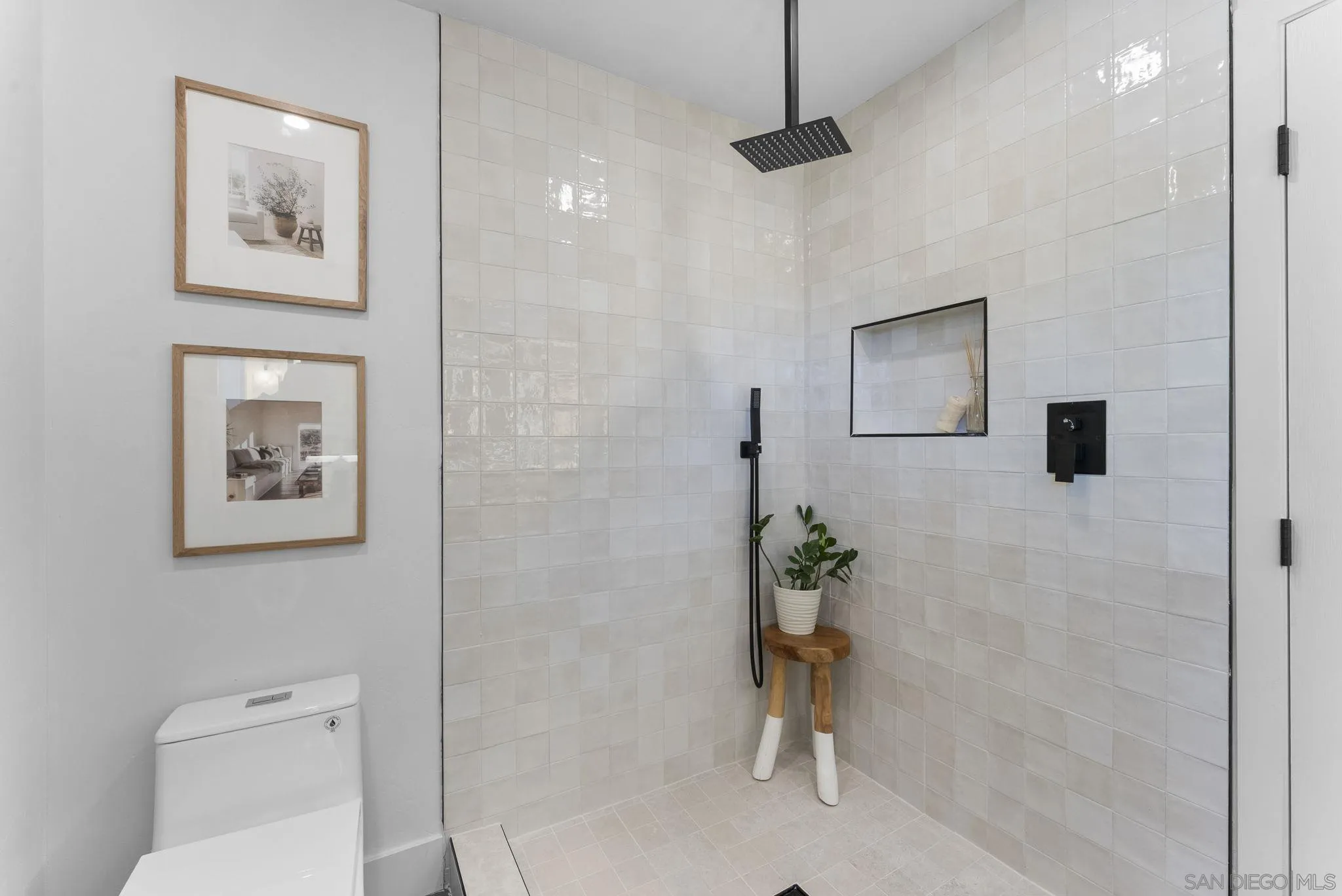 12830 Avenida La Valencia Poway, CA 92064 - Photo 23 of 47 a bathroom with a toilet a sink and a shower