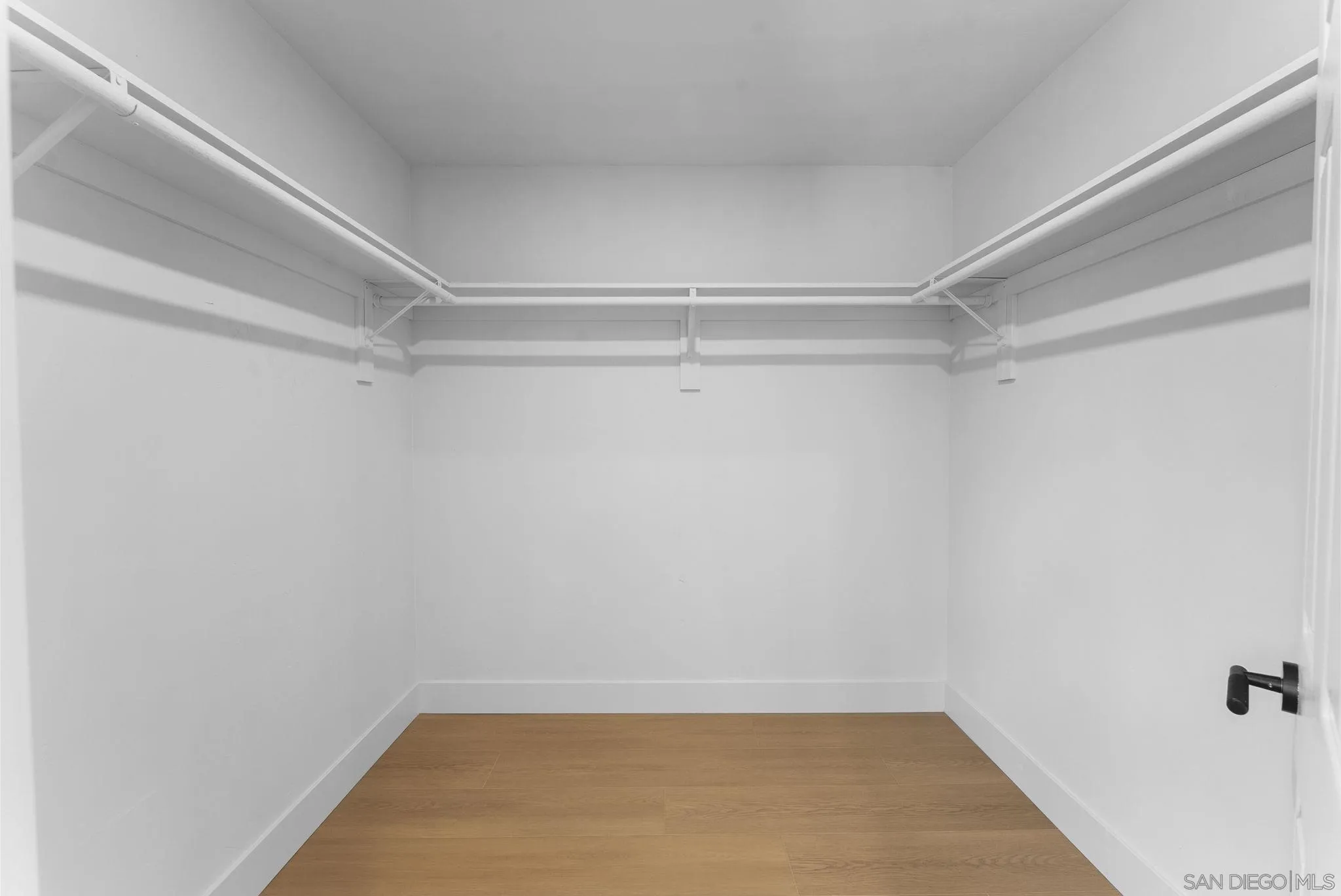 12830 Avenida La Valencia Poway, CA 92064 - Photo 24 of 47 a view of a room with shelf on the wall