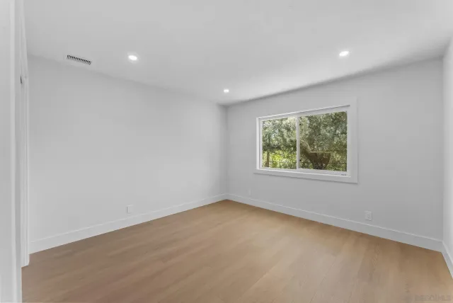 swimming pool view with a seating space