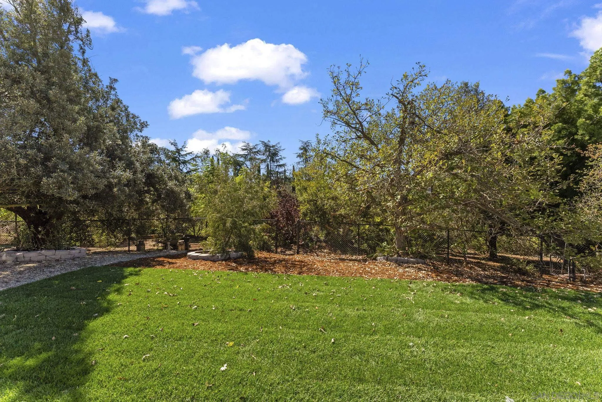12830 Avenida La Valencia Poway, CA 92064 - Photo 39 of 47 a view of outdoor space with deck and yard