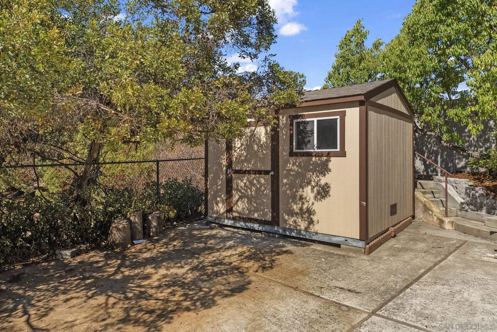 12830 Avenida La Valencia Poway, CA 92064 - Photo 41 of 47 a view of a house with a tree in the background