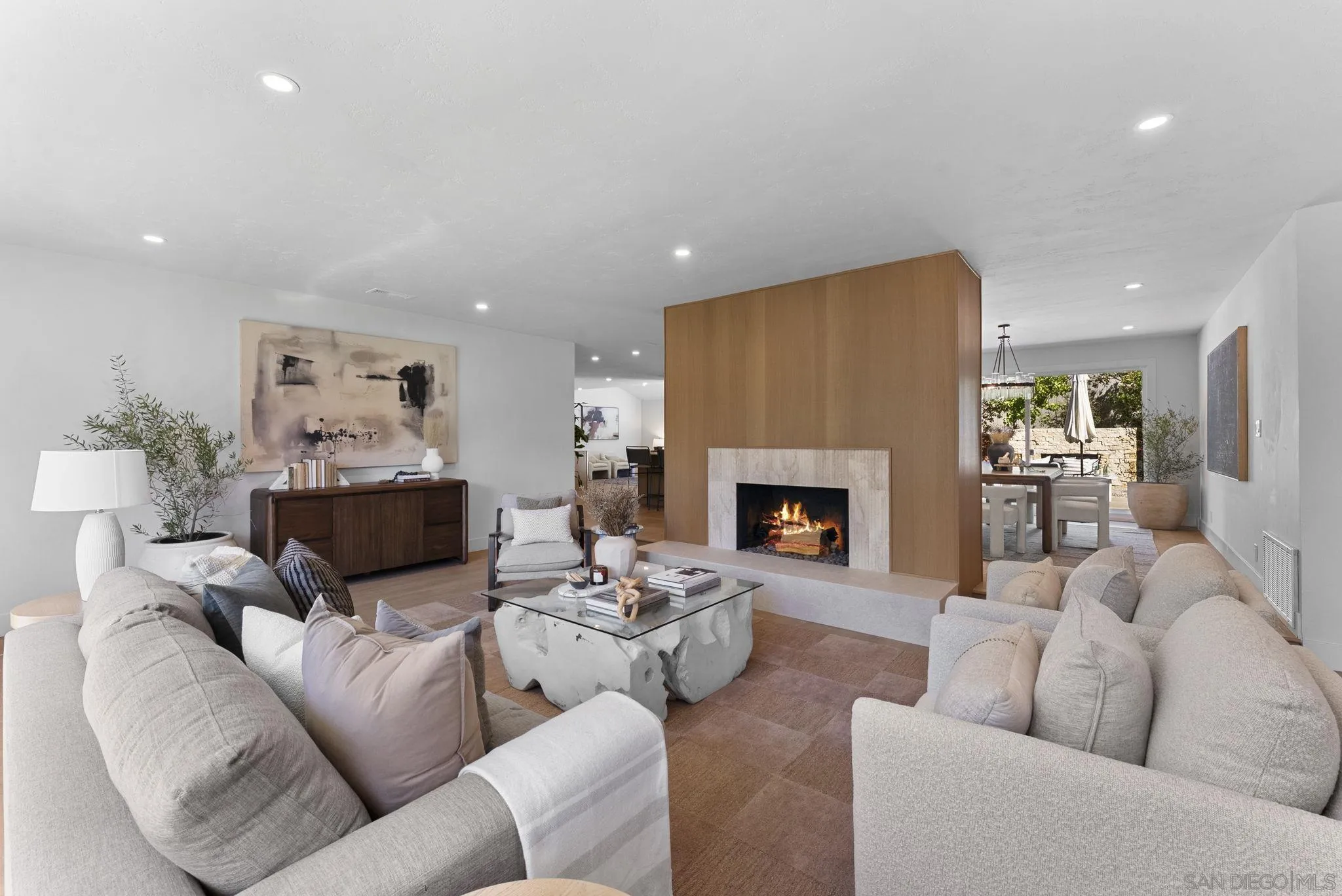 12830 Avenida La Valencia Poway, CA 92064 - Photo 5 of 47 a living room with furniture fireplace and a fireplace