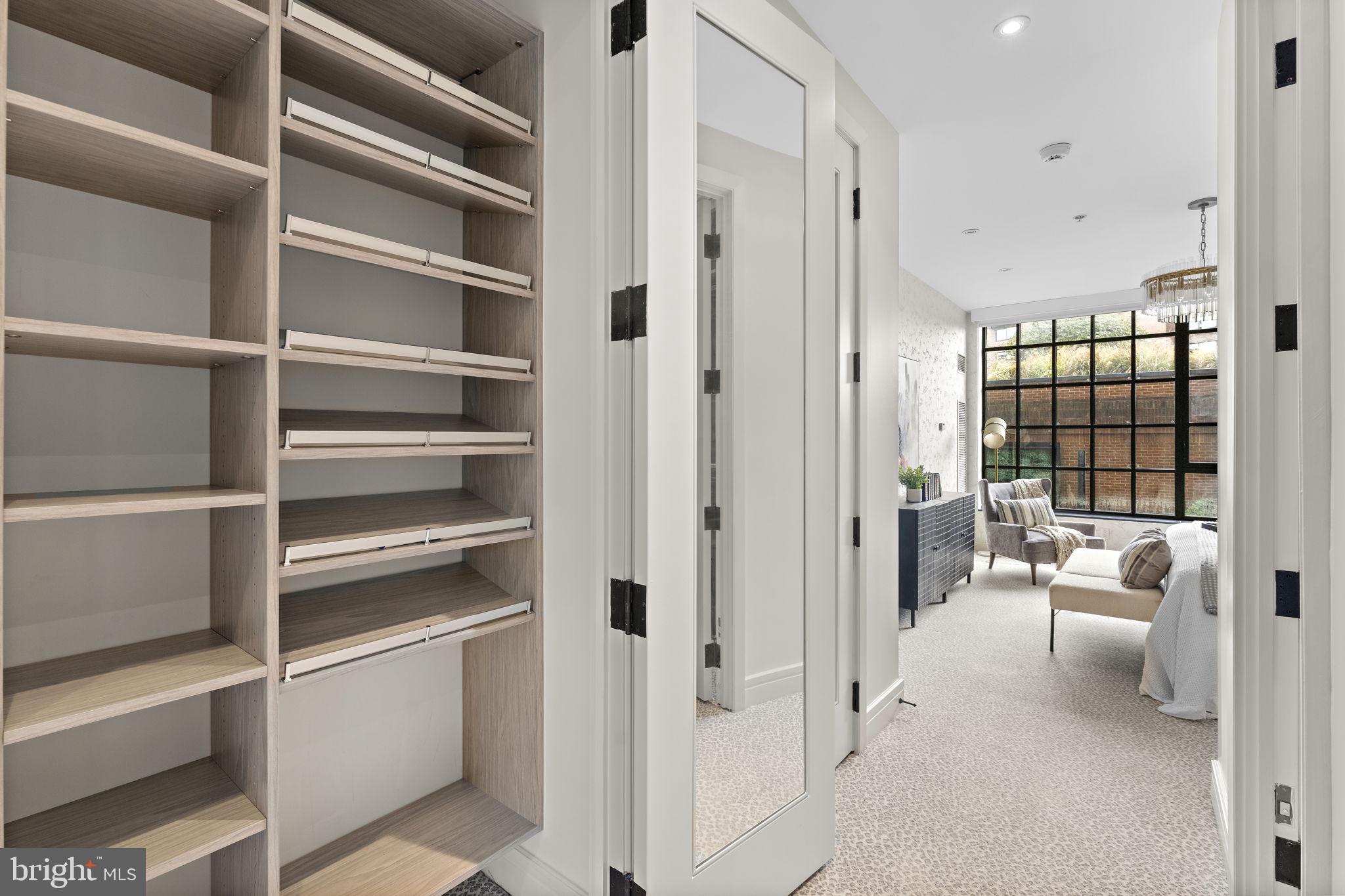 3303 Water Street Northwest, Unit 4L Washington, DC 20007 - Photo 16 of 60 a view of a livingroom with furniture and white walls