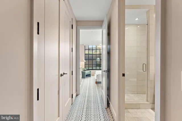 a view of a bathroom from a hallway