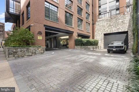 a view of a building with a street