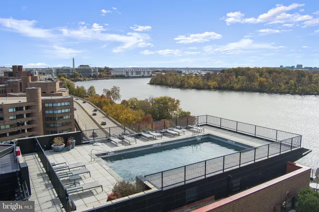 a view of swimming pool from a balcony