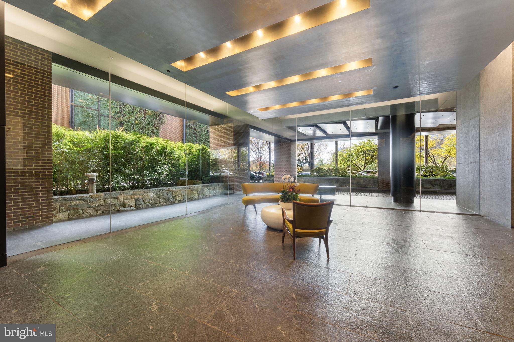 3303 Water Street Northwest, Unit 4L Washington, DC 20007 - Photo 44 of 60 Lobby has sitting area to await your Uber.