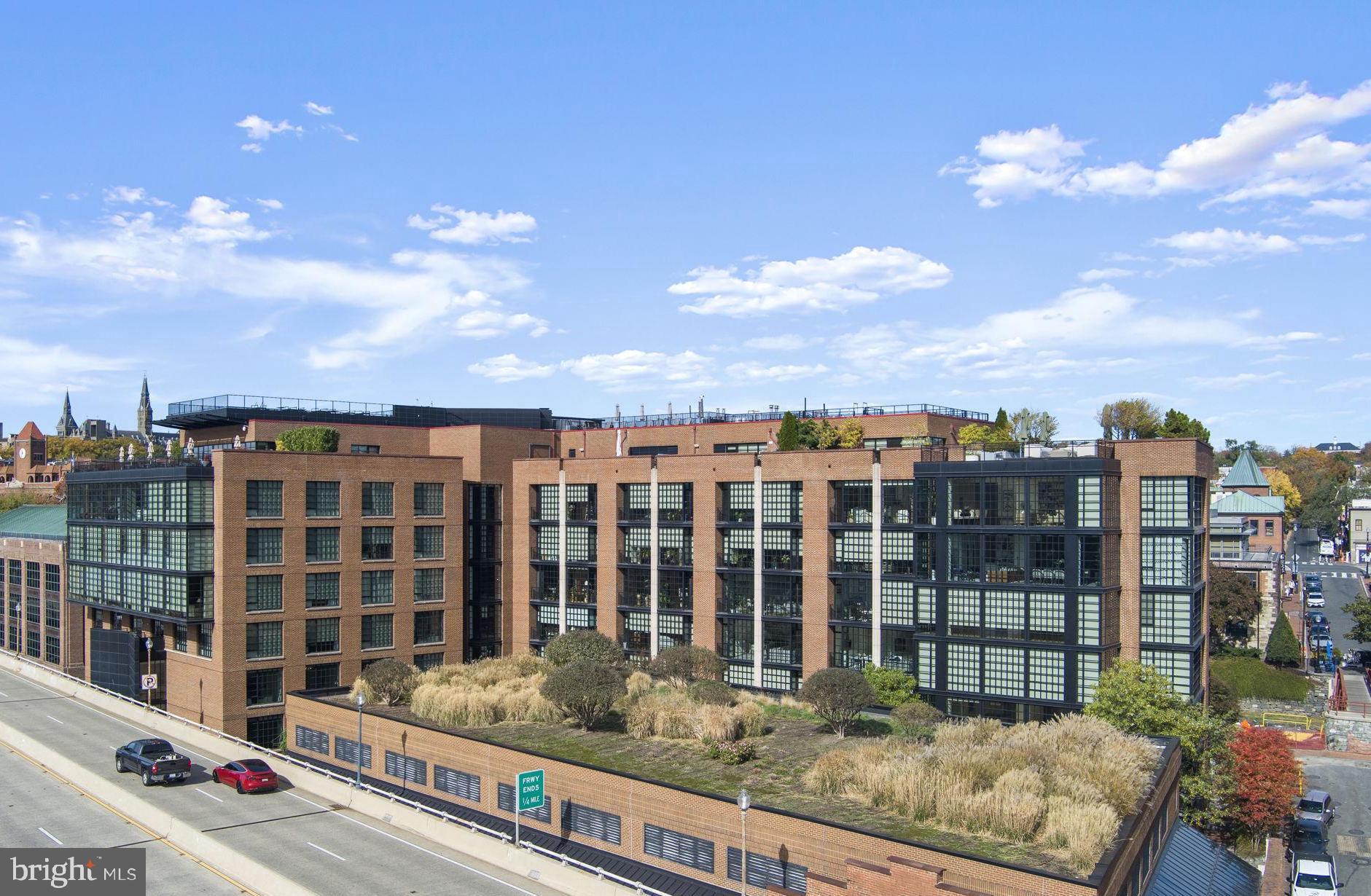 3303 Water Street Northwest, Unit 4L Washington, DC 20007 - Photo 57 of 60 a view of a building from a balcony