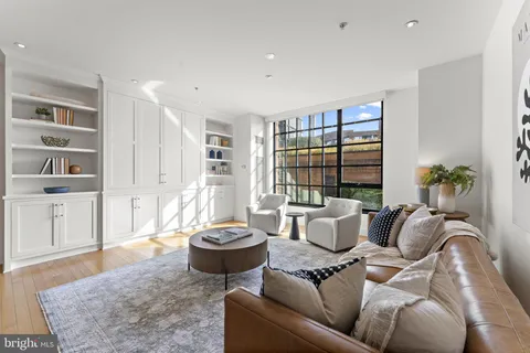 a living room with furniture and a living room