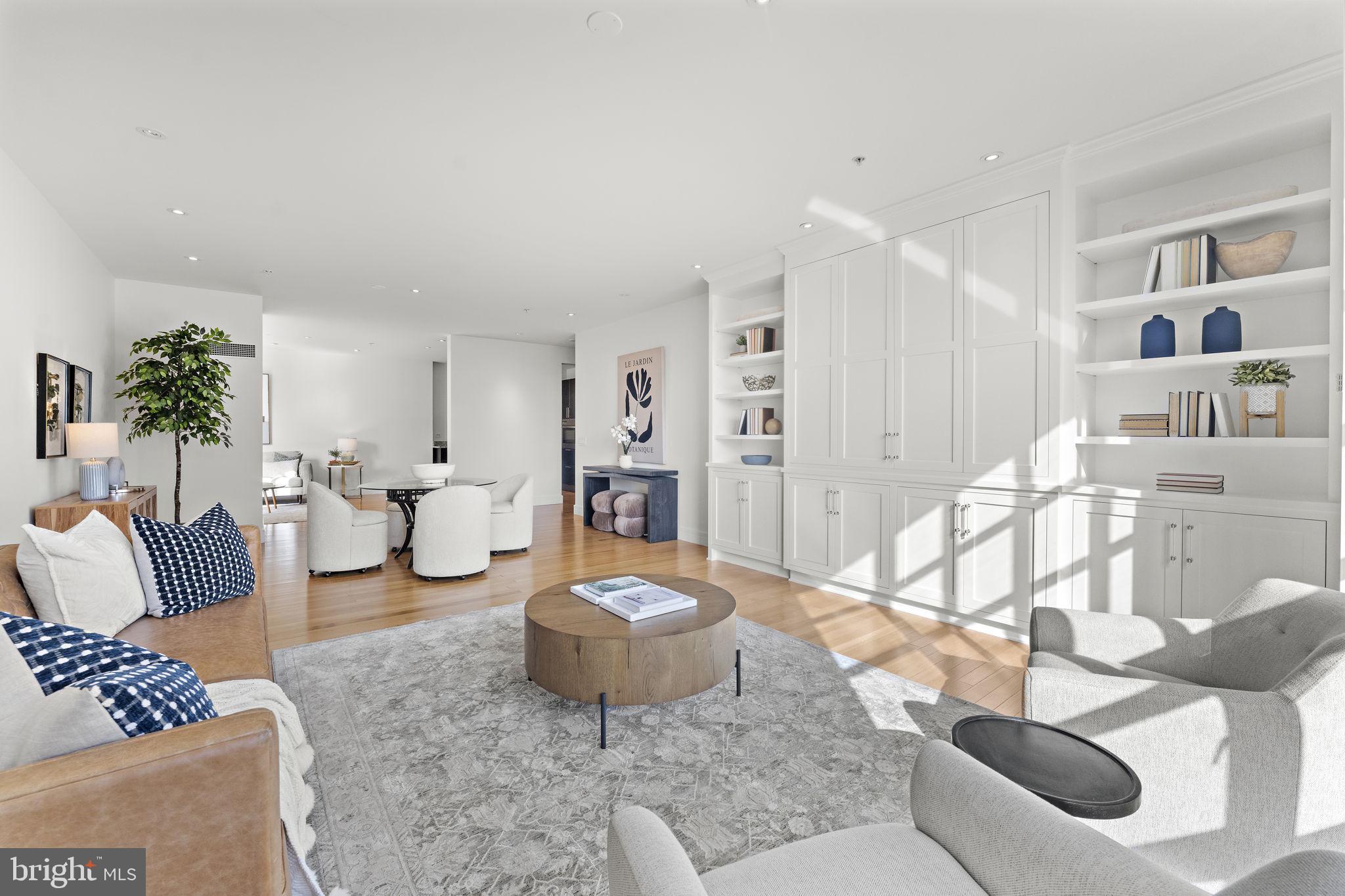 3303 Water Street Northwest, Unit 4L Washington, DC 20007 - Photo 7 of 60 a living room with furniture and a living room