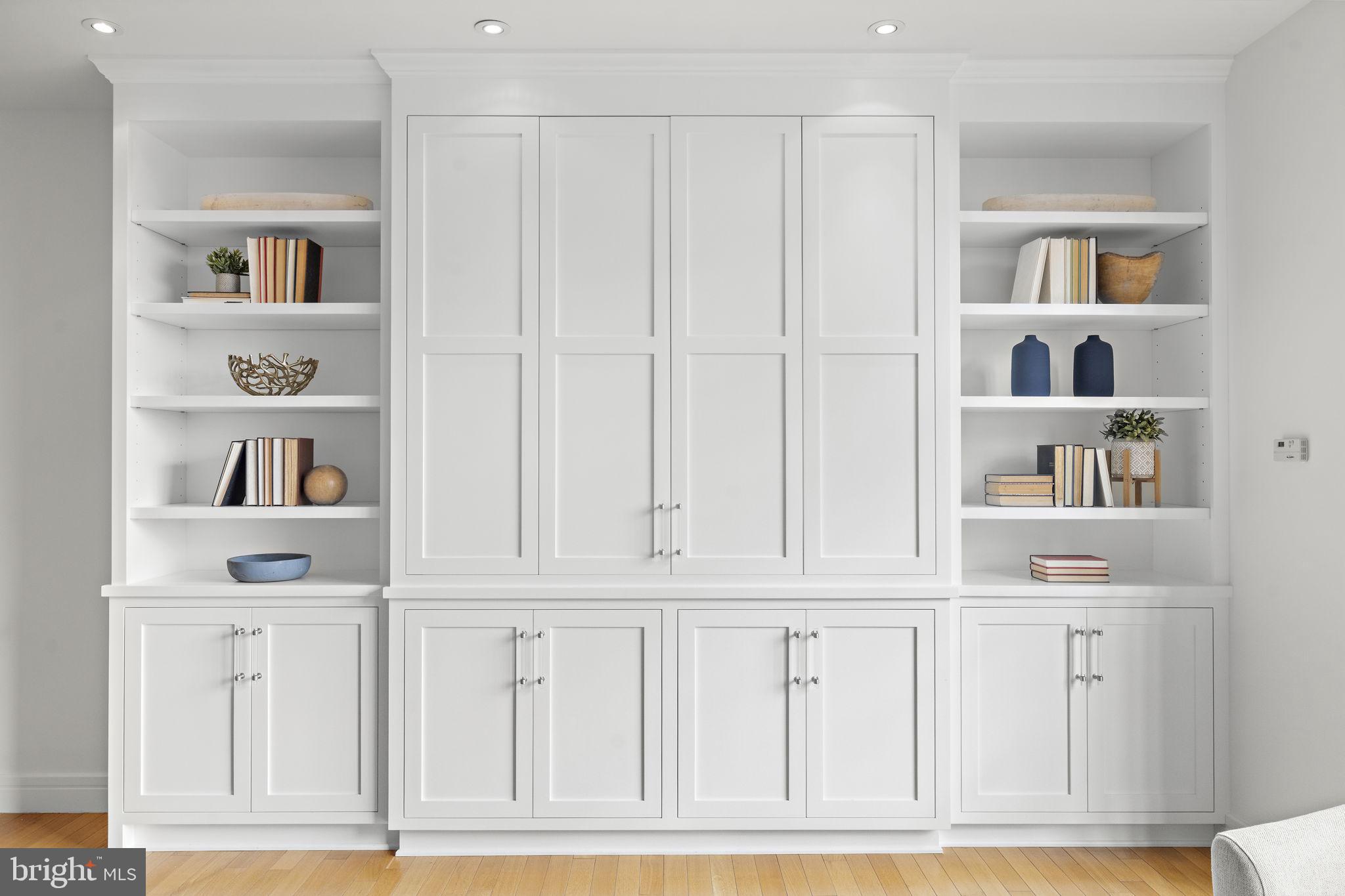 3303 Water Street Northwest, Unit 4L Washington, DC 20007 - Photo 9 of 60 a view of kitchen with white cabinets and cabinet