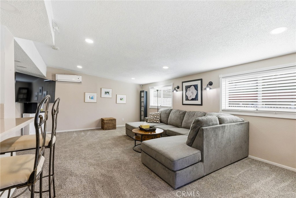 3809 Kern Road Chino, CA 91710 - Photo 15 of 43 a living room with furniture and a window