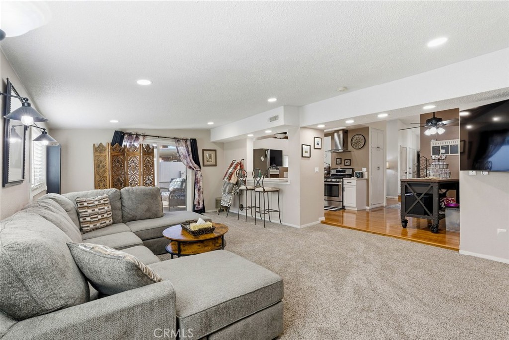 3809 Kern Road Chino, CA 91710 - Photo 18 of 43 a living room with furniture and a flat screen tv