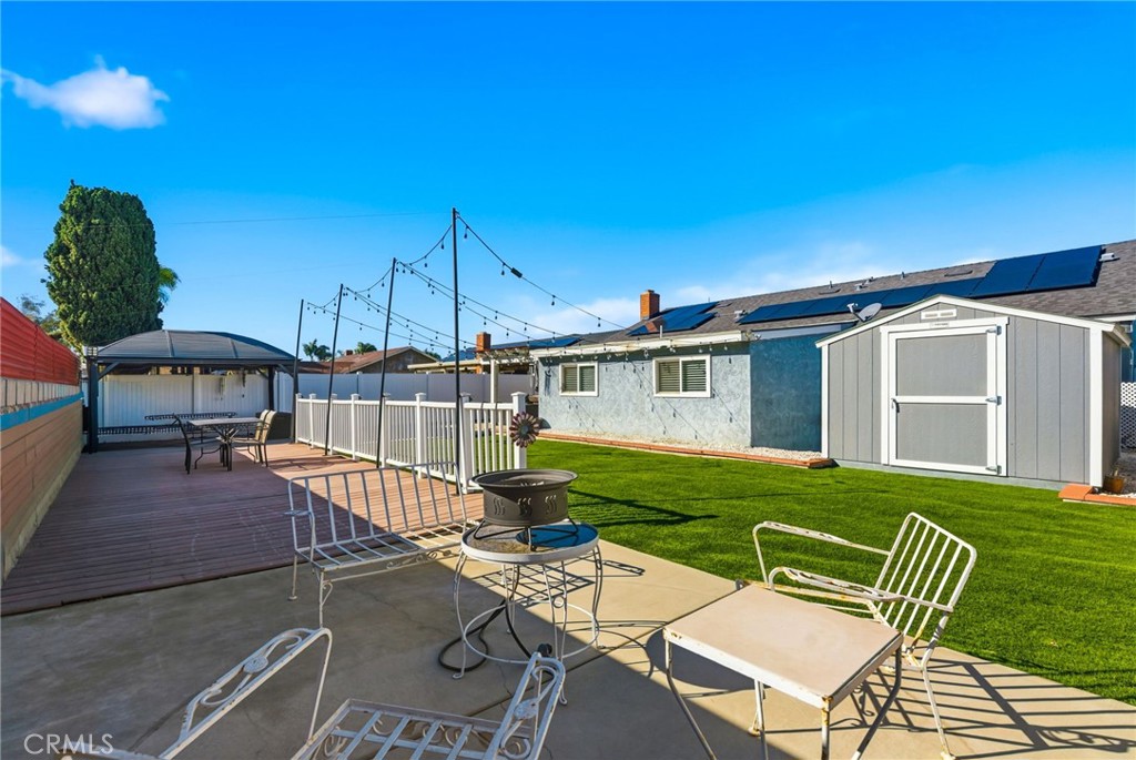3809 Kern Road Chino, CA 91710 - Photo 33 of 43 a view of a house with backyard sitting area and garden