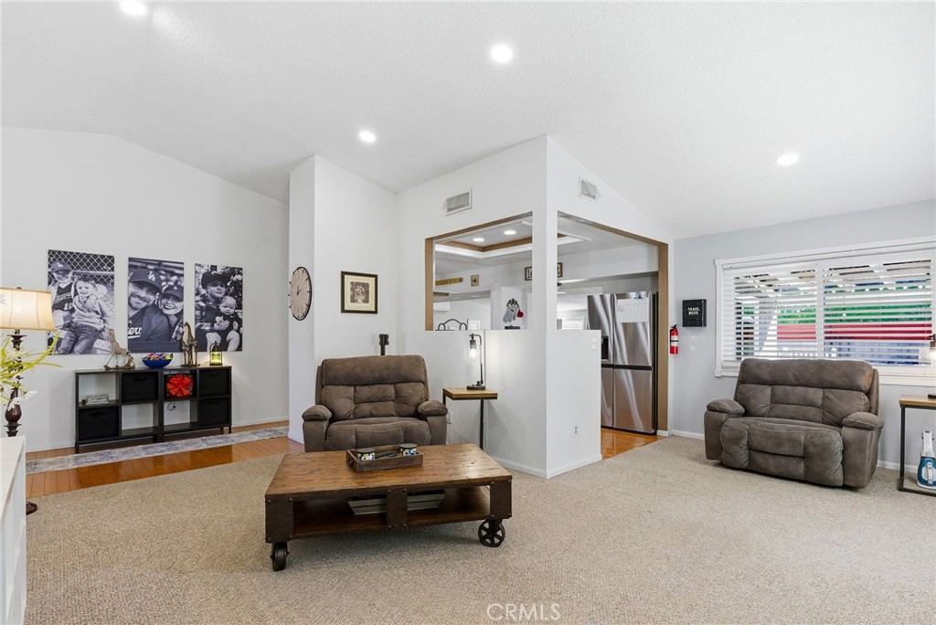 3809 Kern Road Chino, CA 91710 - Photo 9 of 43 a living room with furniture and a flat screen tv