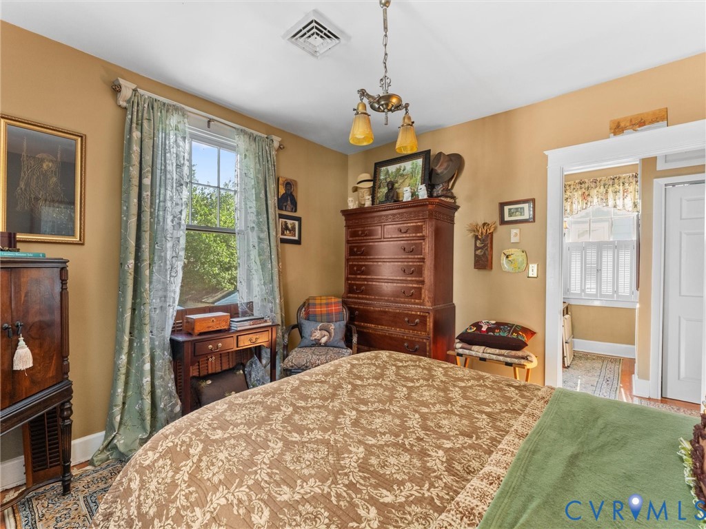 1812 Seddon Road Richmond, VA 23227 - Photo 38 of 56 Bedroom featuring warm-toned walls, a window with