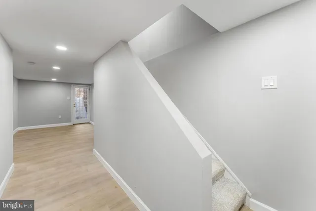 a view of hallway with stairs
