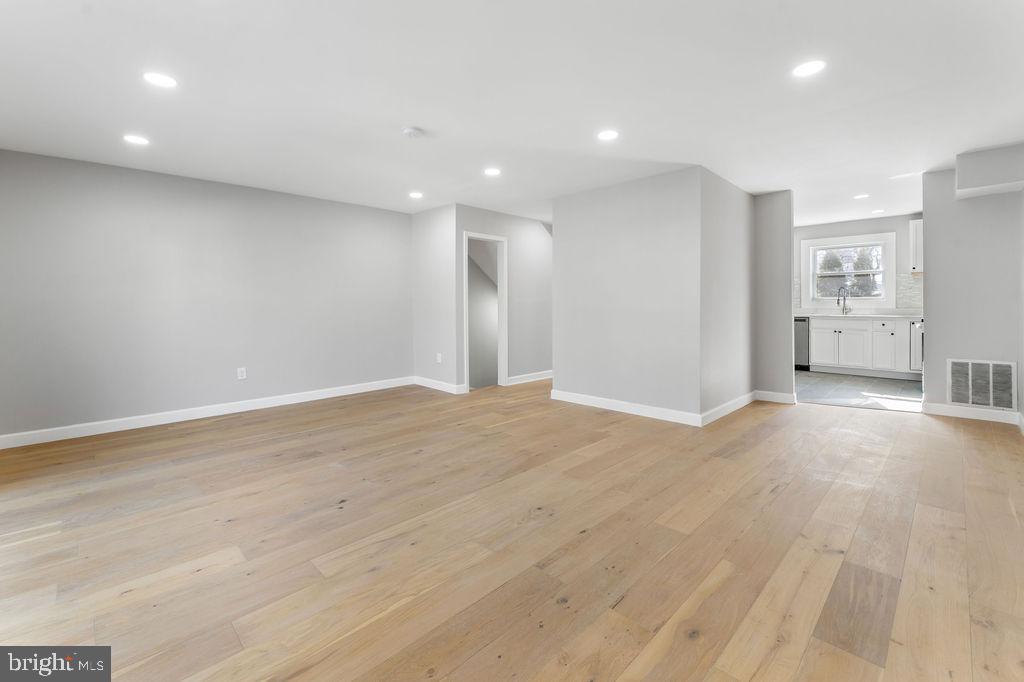 5034 Nash Street Northeast Washington, DC 20019 - Photo 9 of 36 a view of empty room with wooden floor