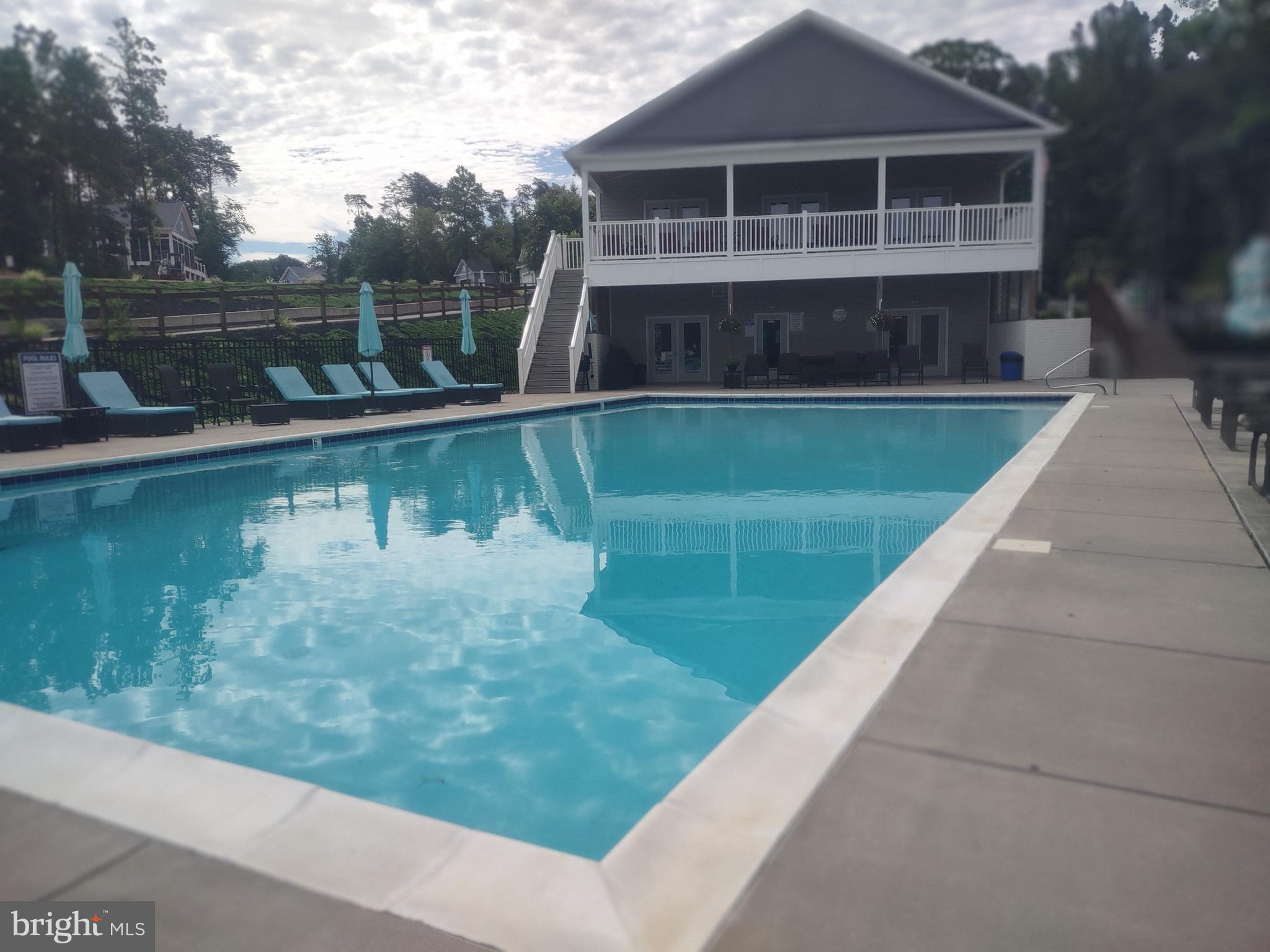 74 Sunset Loop Mineral, VA 23117 - Photo 4 of 13 Clubhouse with Saltwater Pool