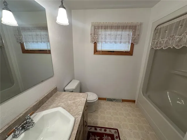 a kitchen with furniture and a kitchen