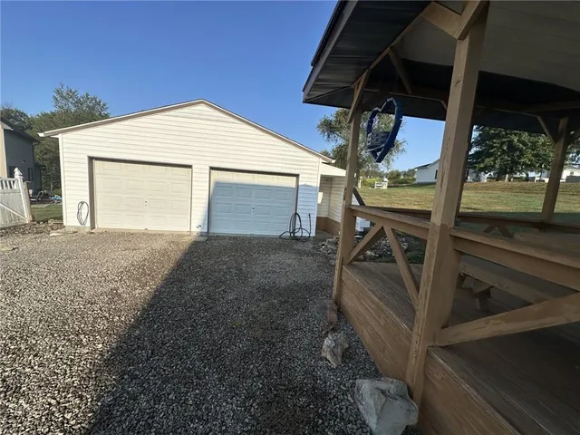 a view of a backyard with an outdoor space