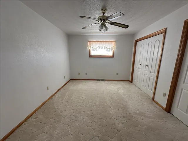 a hallway with a large window