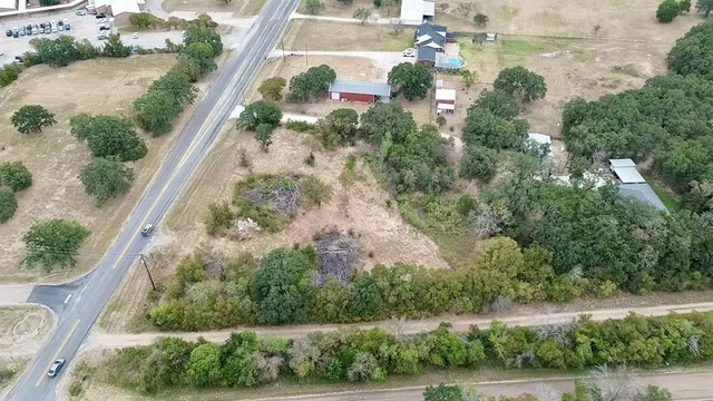 an aerial view of residential house with outdoor space
