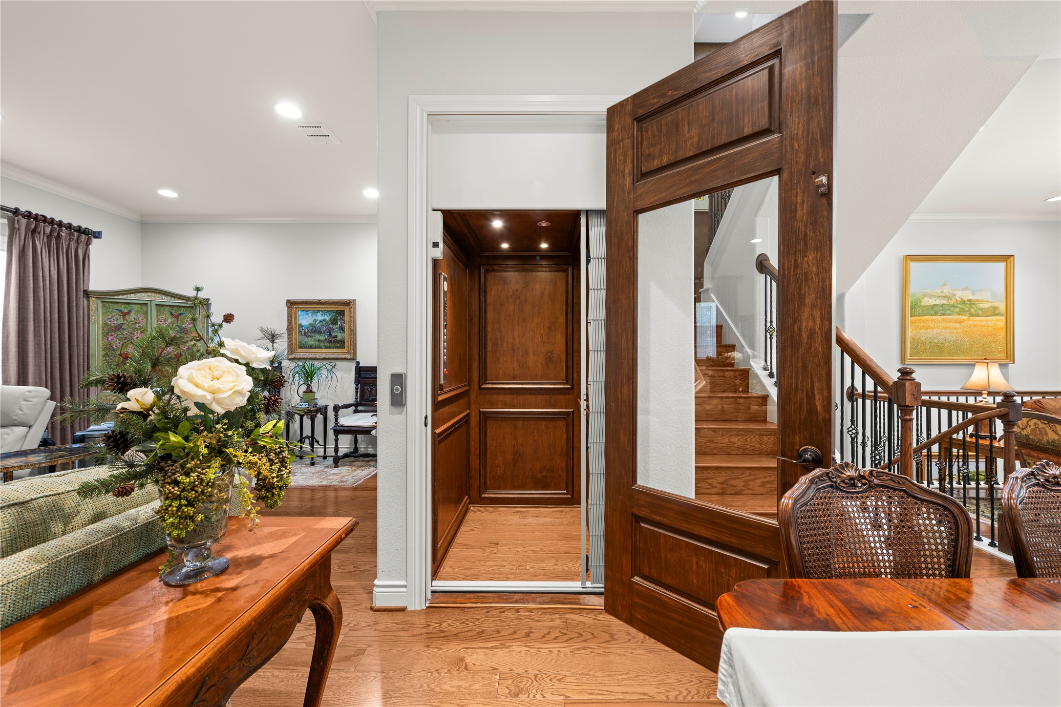 204 Adams Street Georgetown, TX 78628 - Photo 13 of 33 The elevator with a classic wood interior comes.