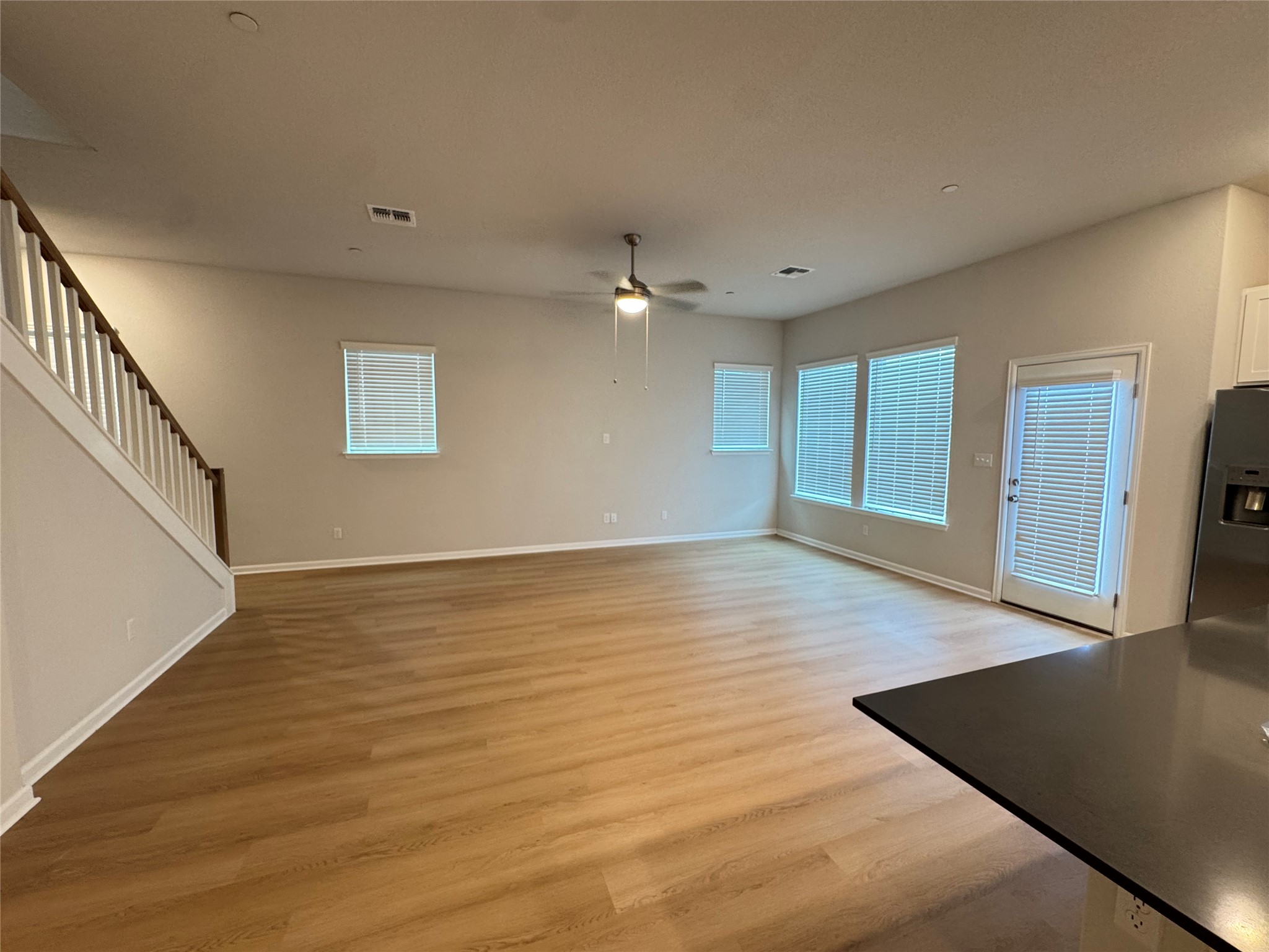 3000 Chisholm Trail Road, Unit 3 Round Rock, TX 78681 - Photo 7 of 28 a view of a room wooden floor and staircase