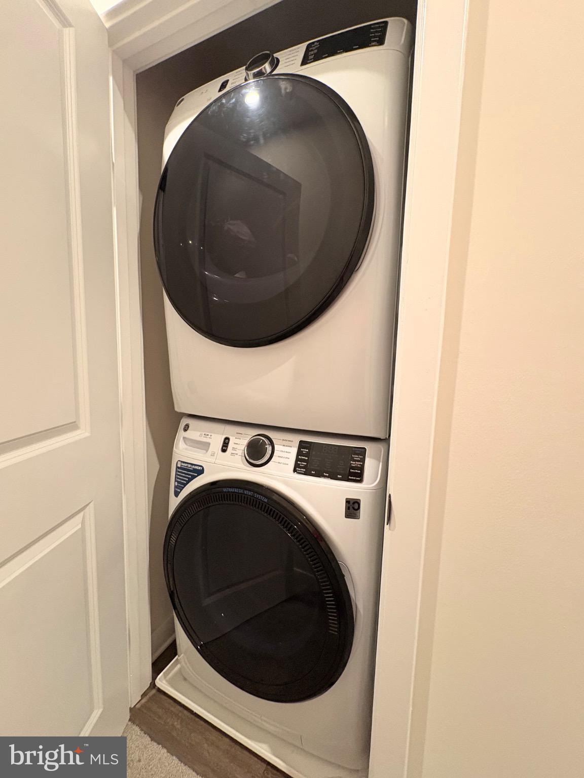736 Watts Street Baltimore, MD 21217 - Photo 31 of 32 a utility room with dryer and washer