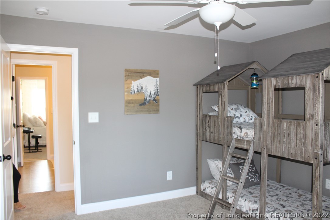 3270 Thrower Road Hope Mills, NC 28348 - Photo 34 of 50 a view of a livingroom with furniture and chandelier fan
