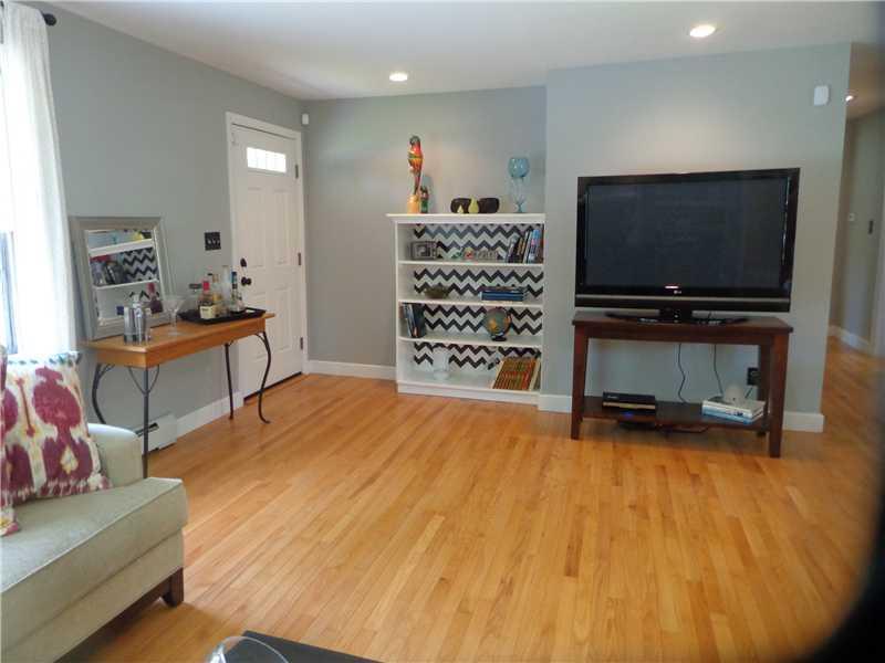 11 Woodville Road Falmouth, ME 04105 - Photo 11 of 35 Living Room. Built-ins next to...