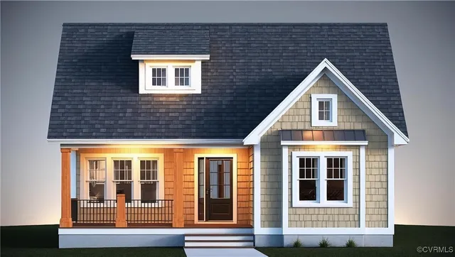 a view of a brick house with large windows