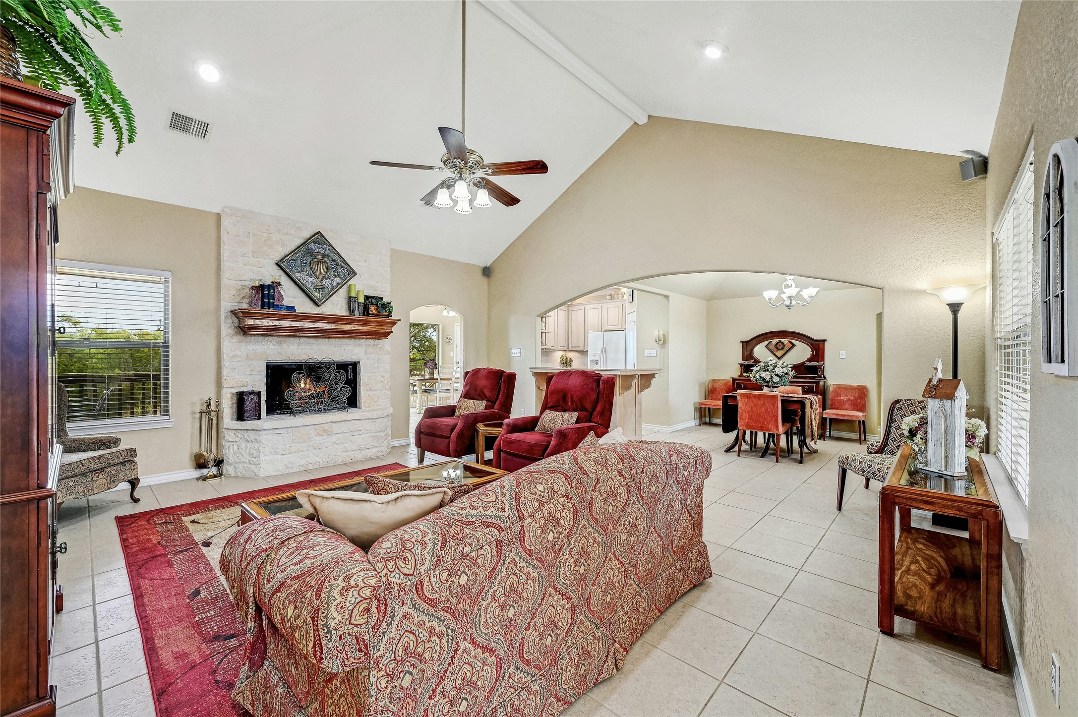1370 Sunset View Fischer, TX 78623 - Photo 5 of 29 Beautiful stone fireplace is a focal point of the living room.