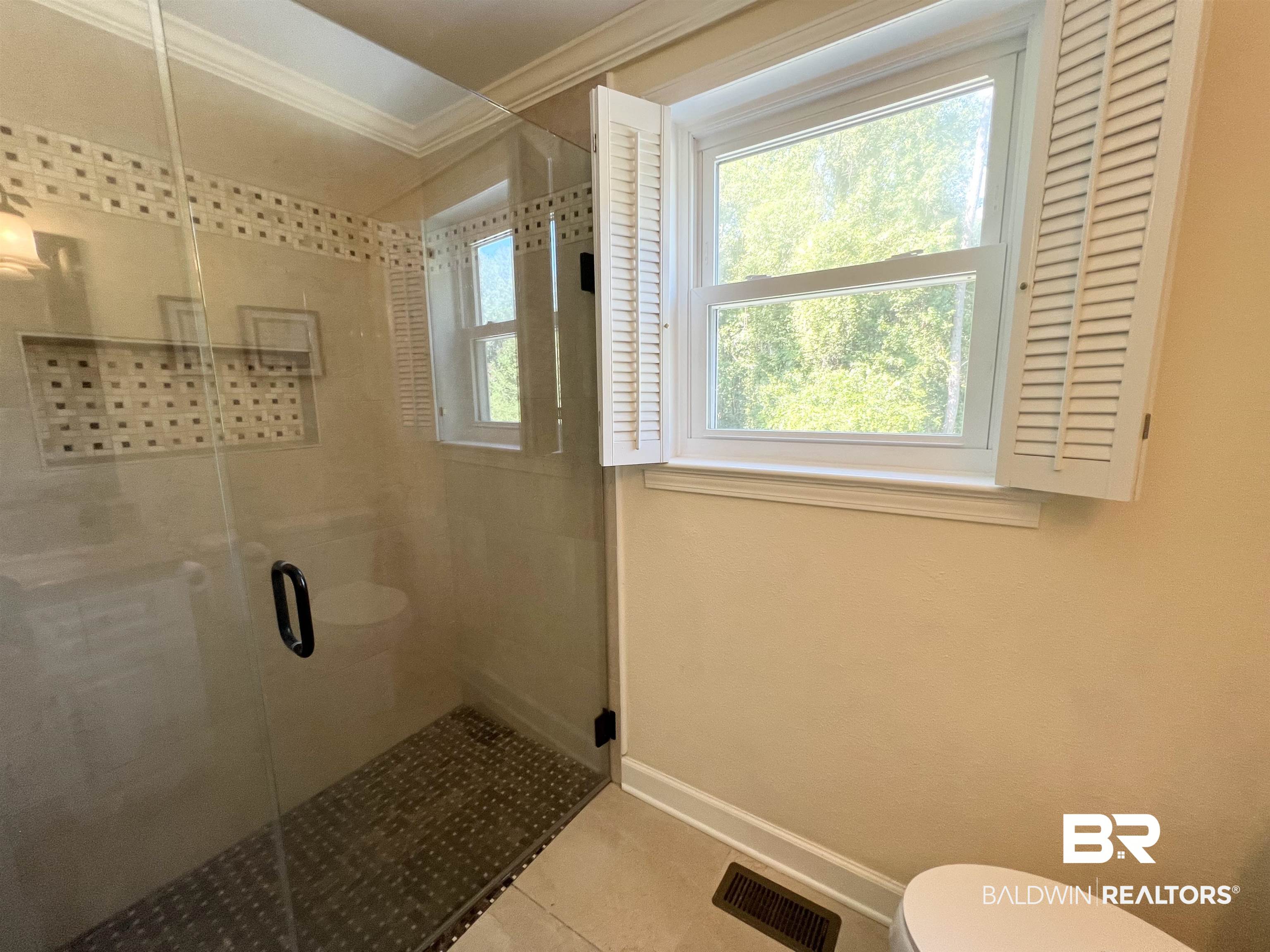 2691 Appleton Road Brewton, AL 36426 - Photo 27 of 60 Full bathroom with a stall shower, ornamental molding, and light tile patterned floors