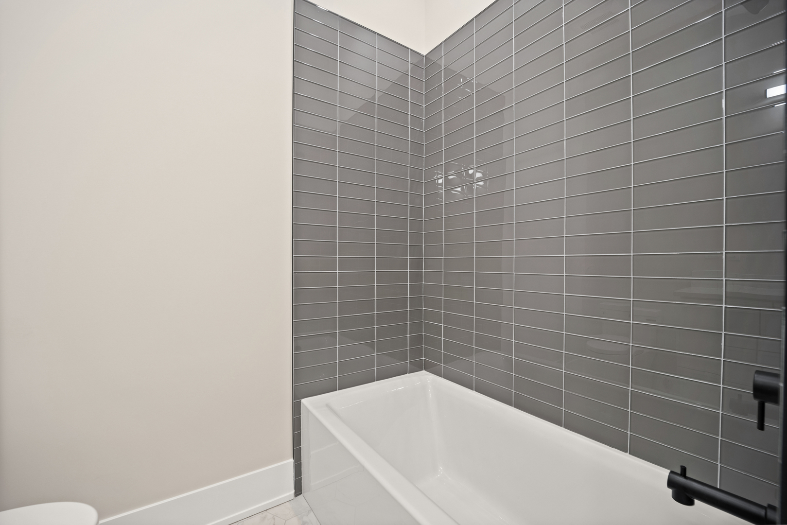 4347 North Richmond Street, Unit 3N Chicago, IL 60618 - Photo 18 of 34 a white bath tub sitting in a bathroom