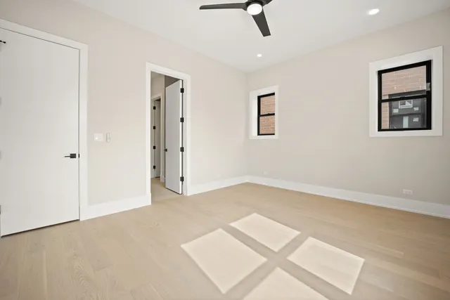 an empty room with fan