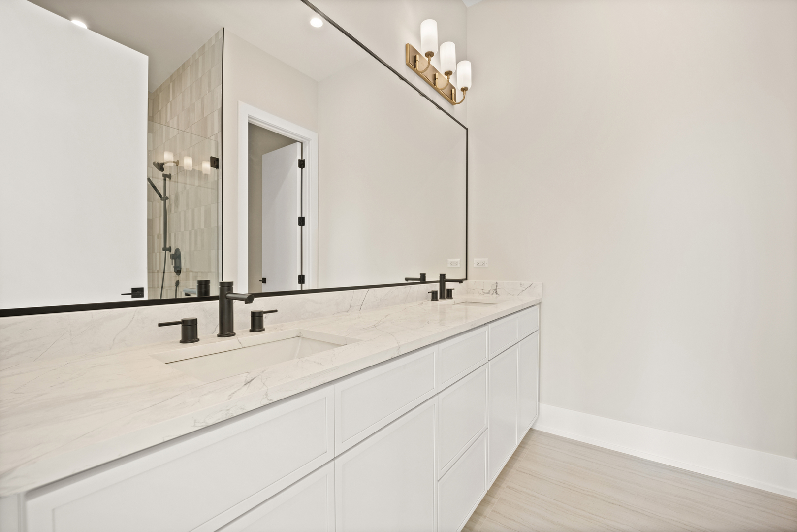4347 North Richmond Street, Unit 3N Chicago, IL 60618 - Photo 23 of 34 a bathroom with a double vanity sink and a mirror