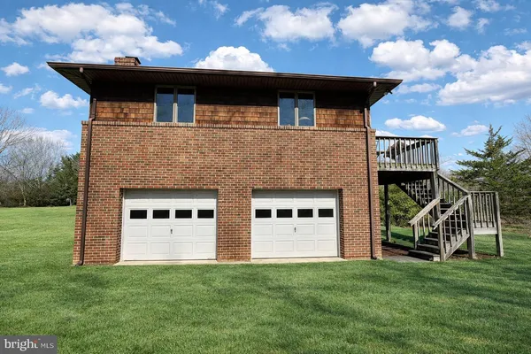 a view of a house with garden