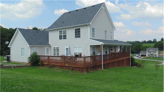 2083 Chester Harris Road Woodlawn, TN 37191 - Photo 11 of 15 Back view of home with fantastic partial wrap around