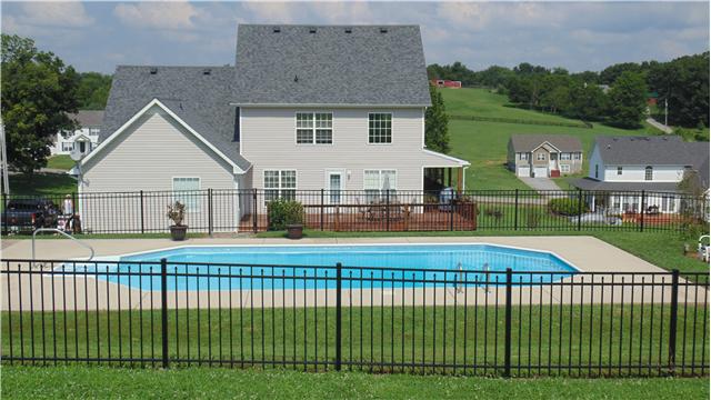 2083 Chester Harris Road Woodlawn, TN 37191 - Photo 14 of 15 Full view of back of home and fenced in, in ground pool! Cant beat it!