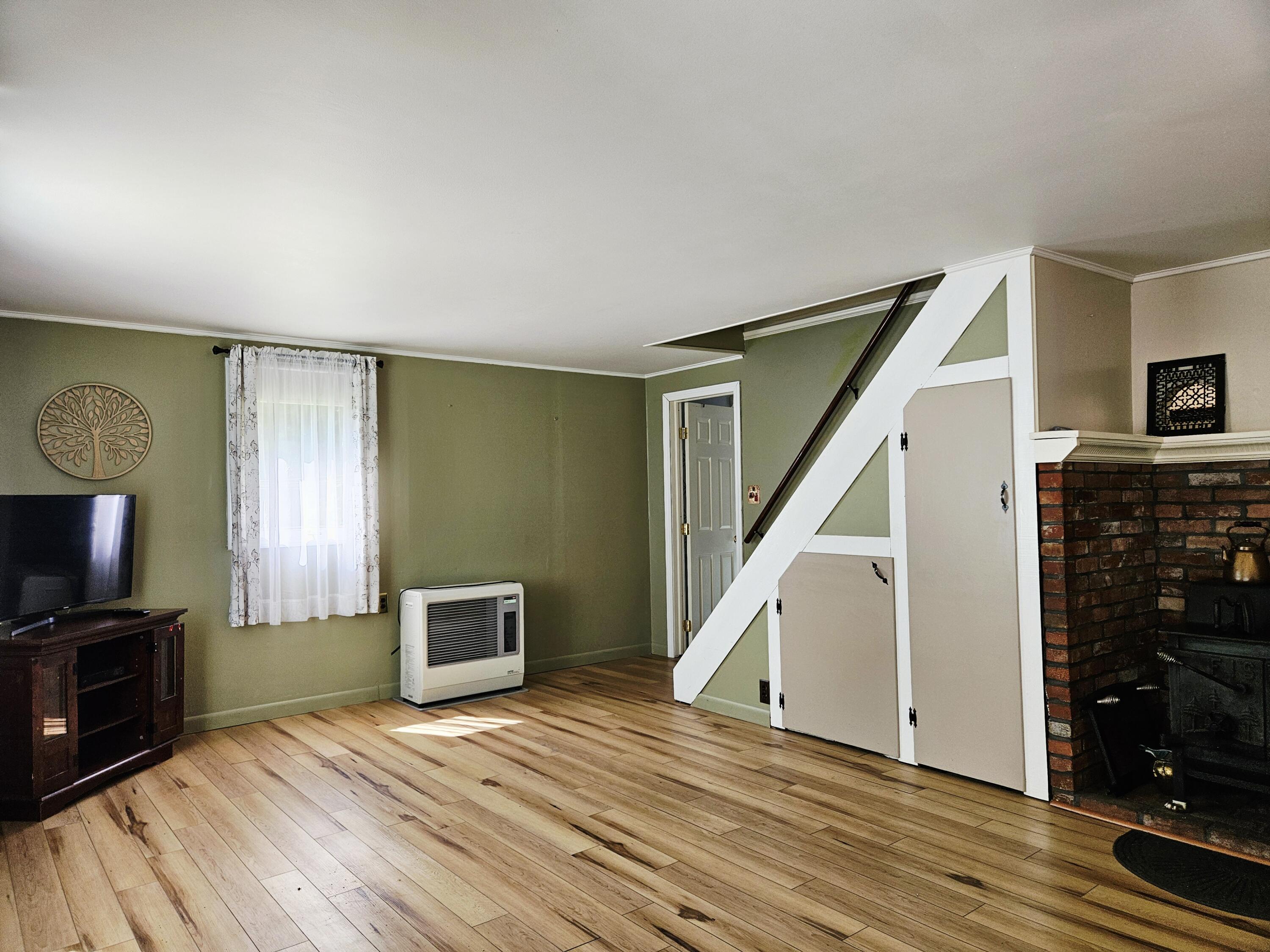 200 Windsor Road Chelsea, ME 04330 - Photo 11 of 25 Living Room Storage