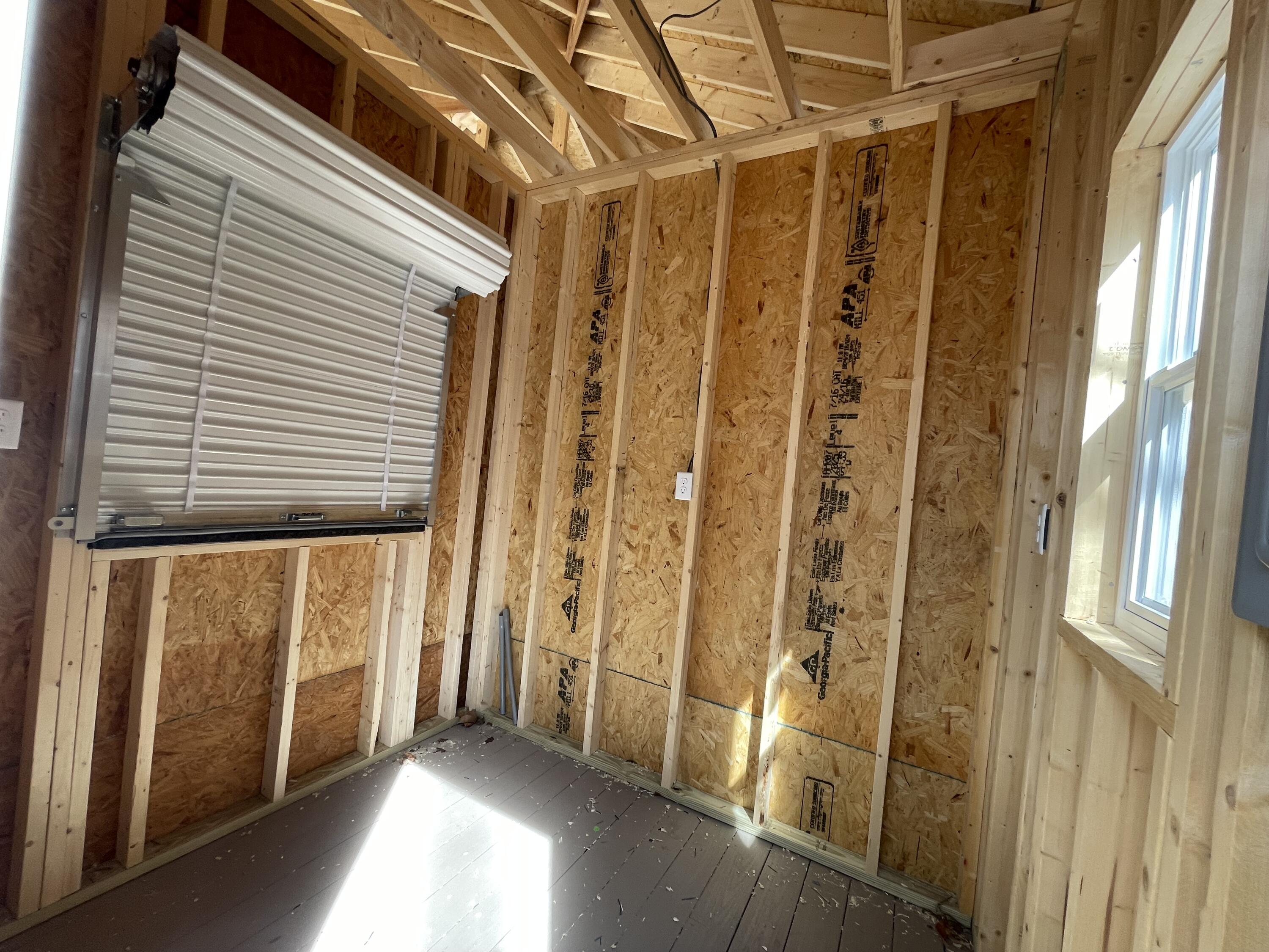 4 Lester Lane Goodview, VA 24095 - Photo 8 of 10 a view of a porch with a door